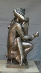 man and woman hugging
