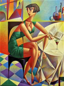 Woman in green dress drinking wine