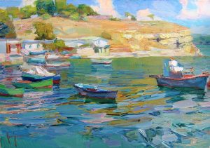 boats on the water by the shore
