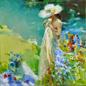 woman in hat in a field of flowers