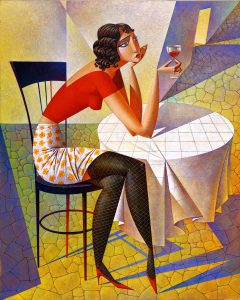woman in red top sitting drinking wine