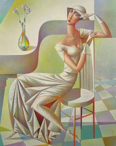 woman in white sitting on chair