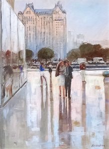 people walking down a wet street in a city