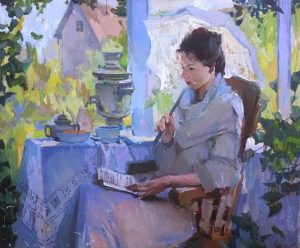 woman sitting in garden reading