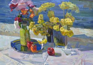 yellow and pink flower still life by the sea