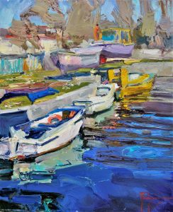 small boats on the water