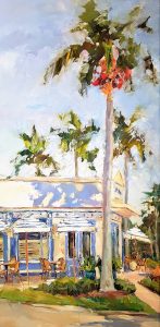 restaurant with palms in front