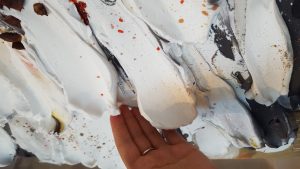 hand touching paint