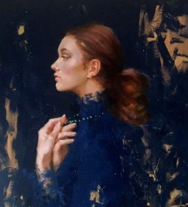 profile of woman in blue