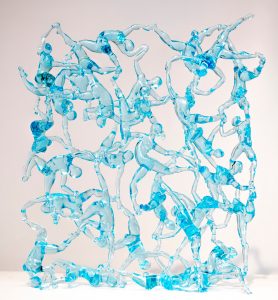 glass wall made from human figures in blue
