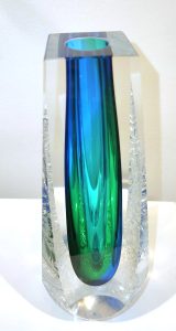 Springs Vase Tall Green	<br />
Hand cast, chiselled, and carved crystal<br />
10 x 3 x 3