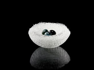 Nestled <br />
Kiln formed glass with cast and patinated bronze eggs<br />
sitting on a silk cushion on a black acrylic base<br />
7 x 7 x 3<br />
