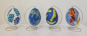 Grouping of paper mache egg sculptures with acrylic and 10,000 crystals