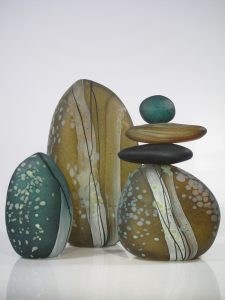 group of stacked River Rock sculptures